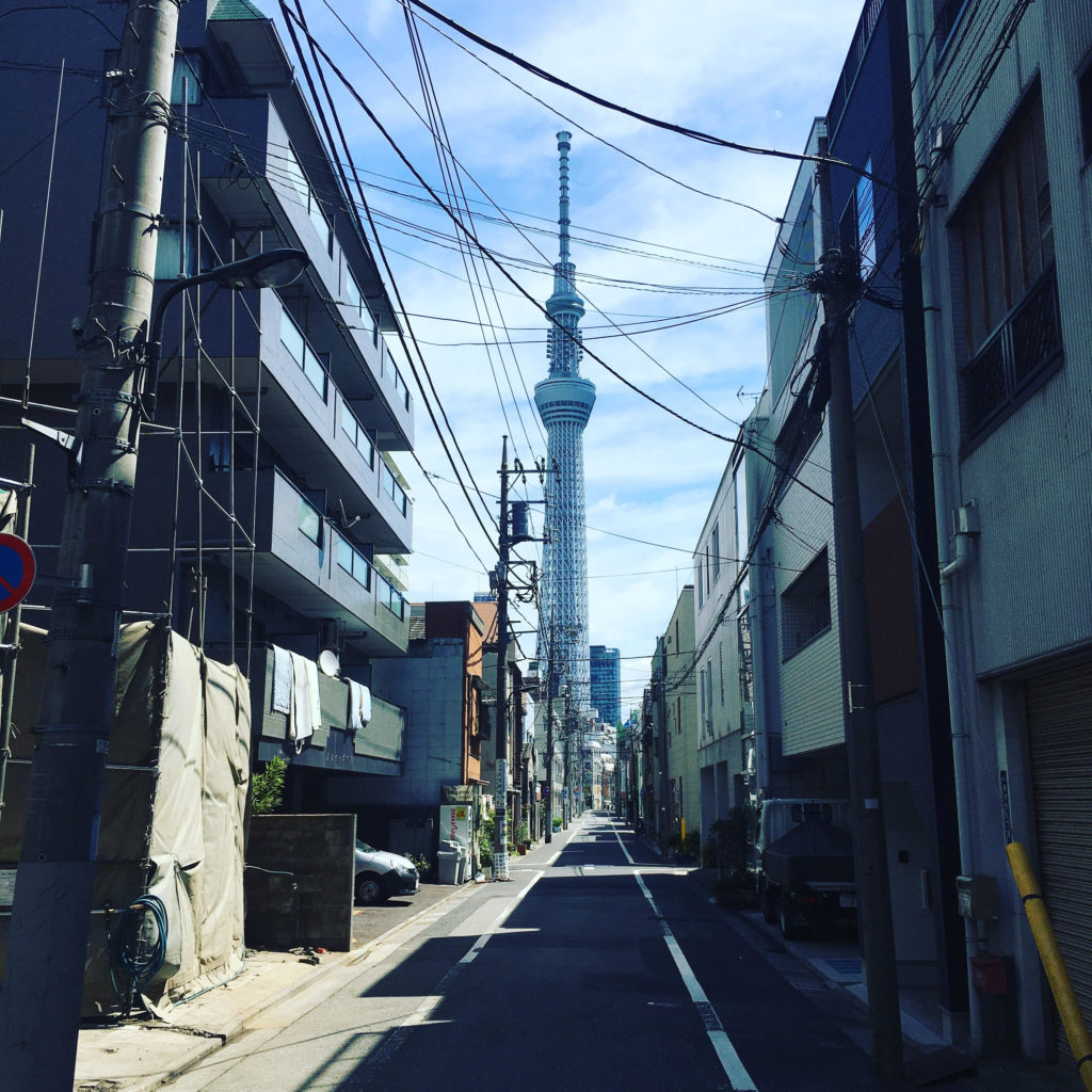 Tokyo Skytree from a very tiny street. perspective, photo by Daniele Frau.